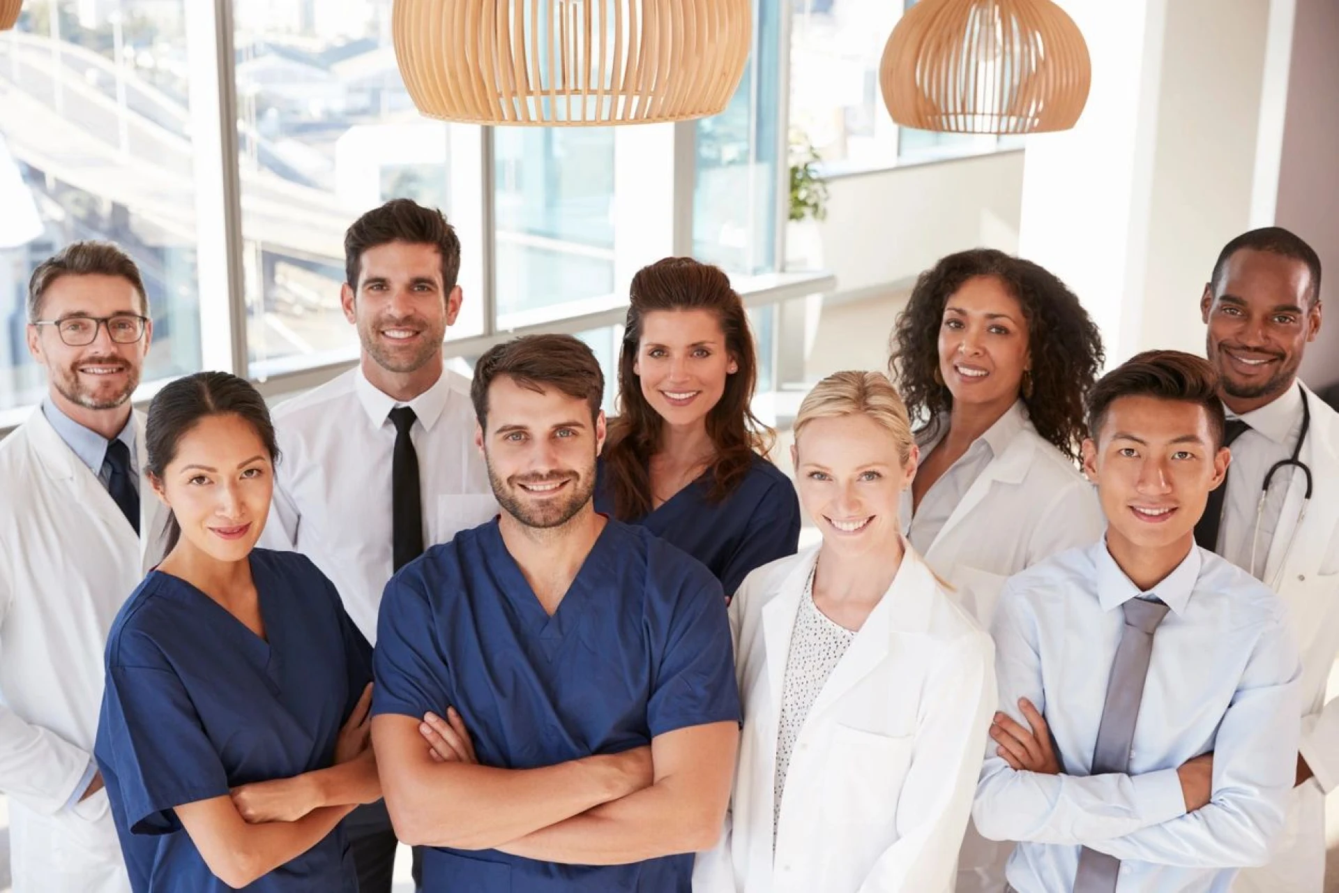 Diverse medical team smiling confidently.